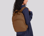 Person wearing the Featherlight Backpack on one shoulder