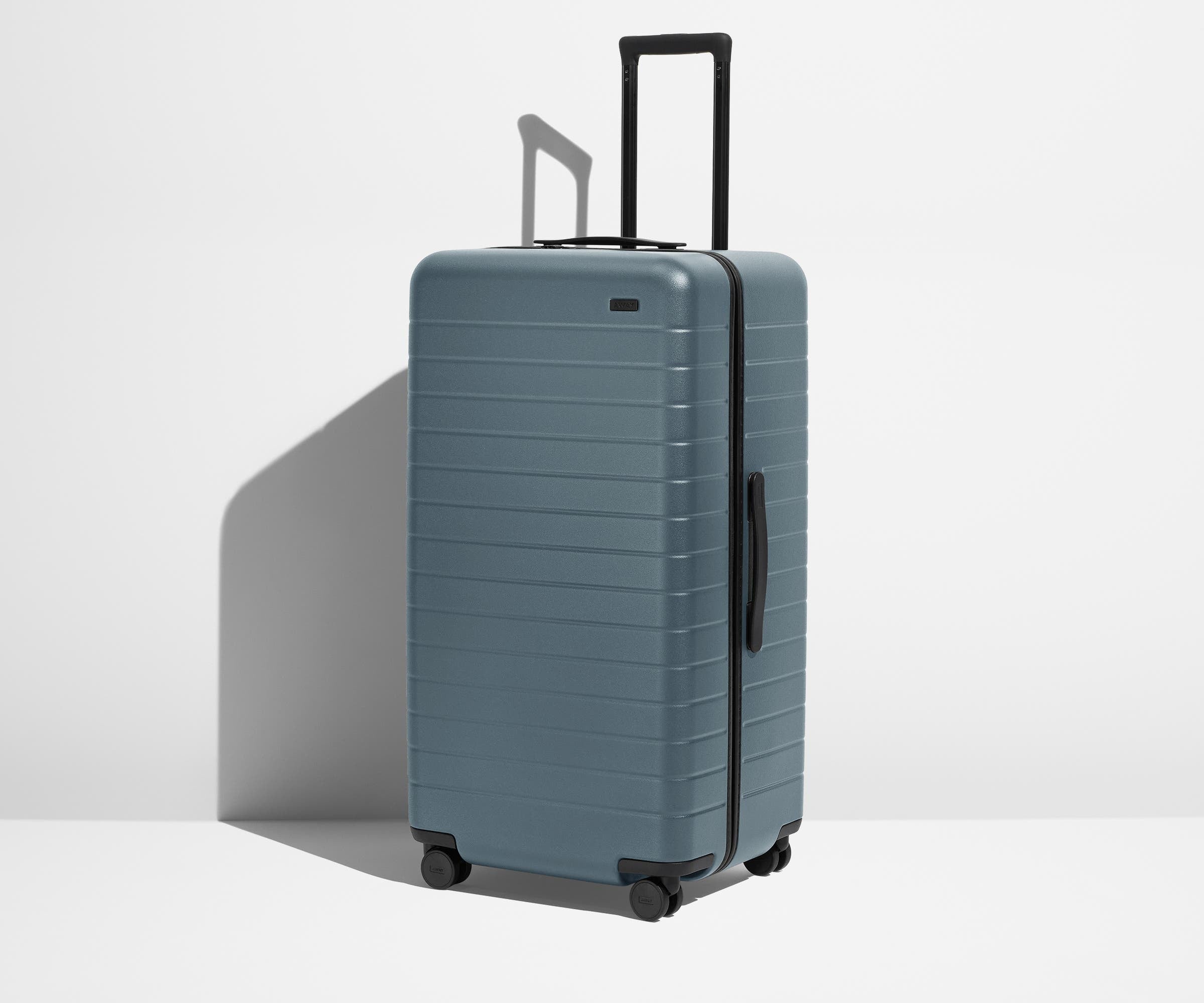 Angled product view of The Trunk suitcase in Coast Blue