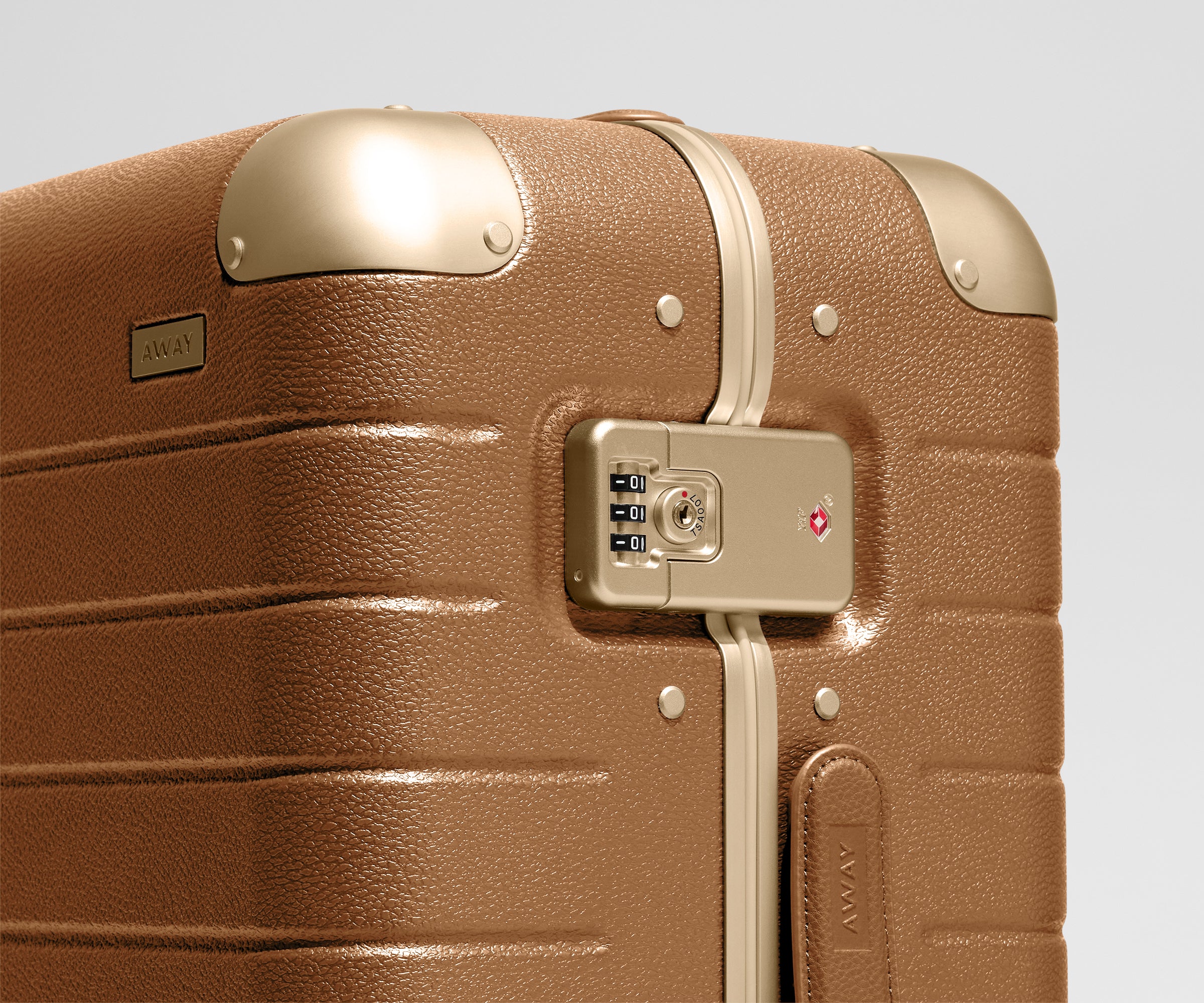 The Aluminum Edge Carry-On in Cognac Brown