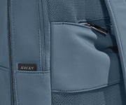 Close up view of the trolley sleeve and hidden back pocket