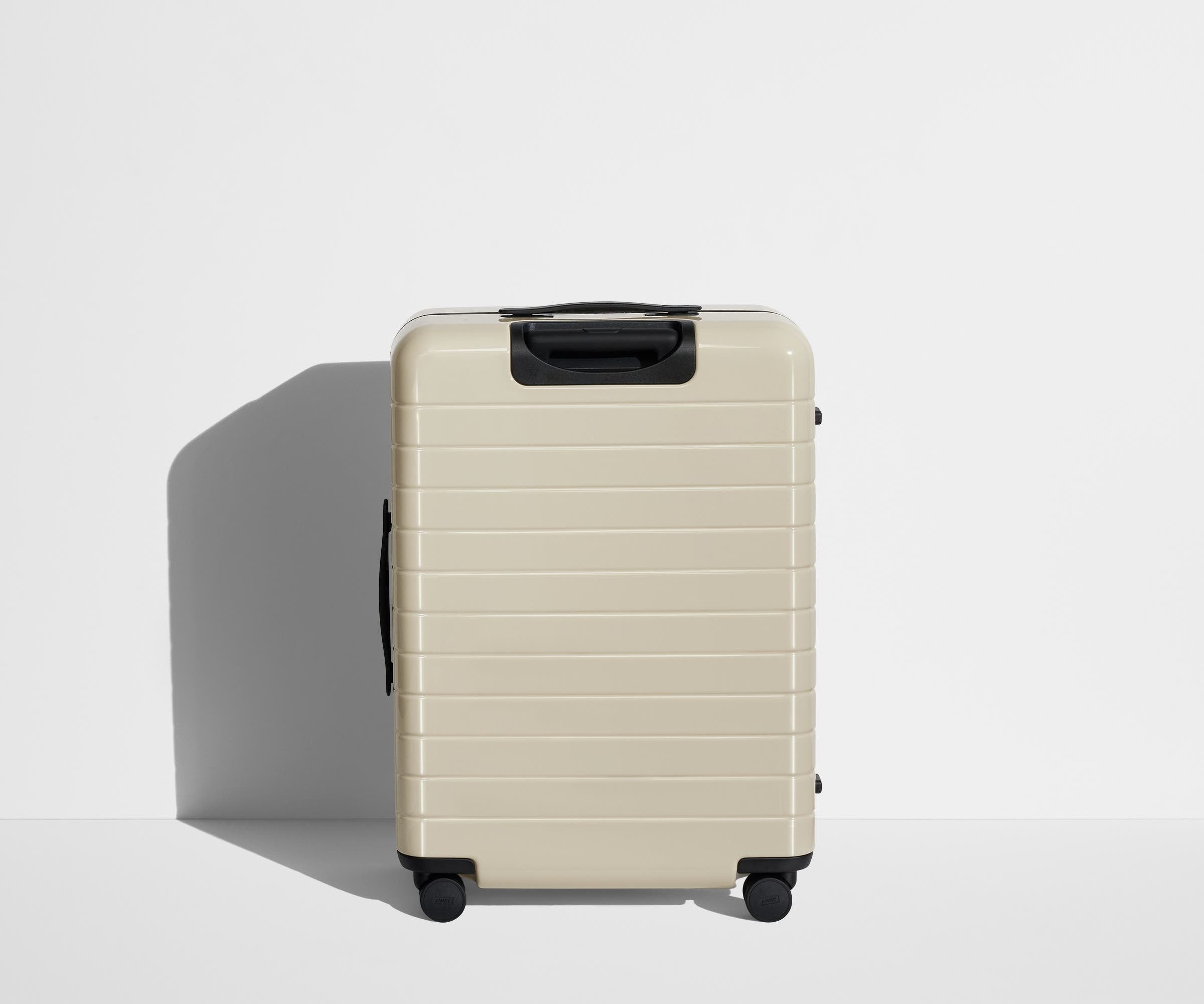 Back product view of The Medium Flex suitcase in Salt White (Gloss)