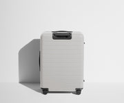 Back product view of The Medium Flex suitcase in Cloud Gray